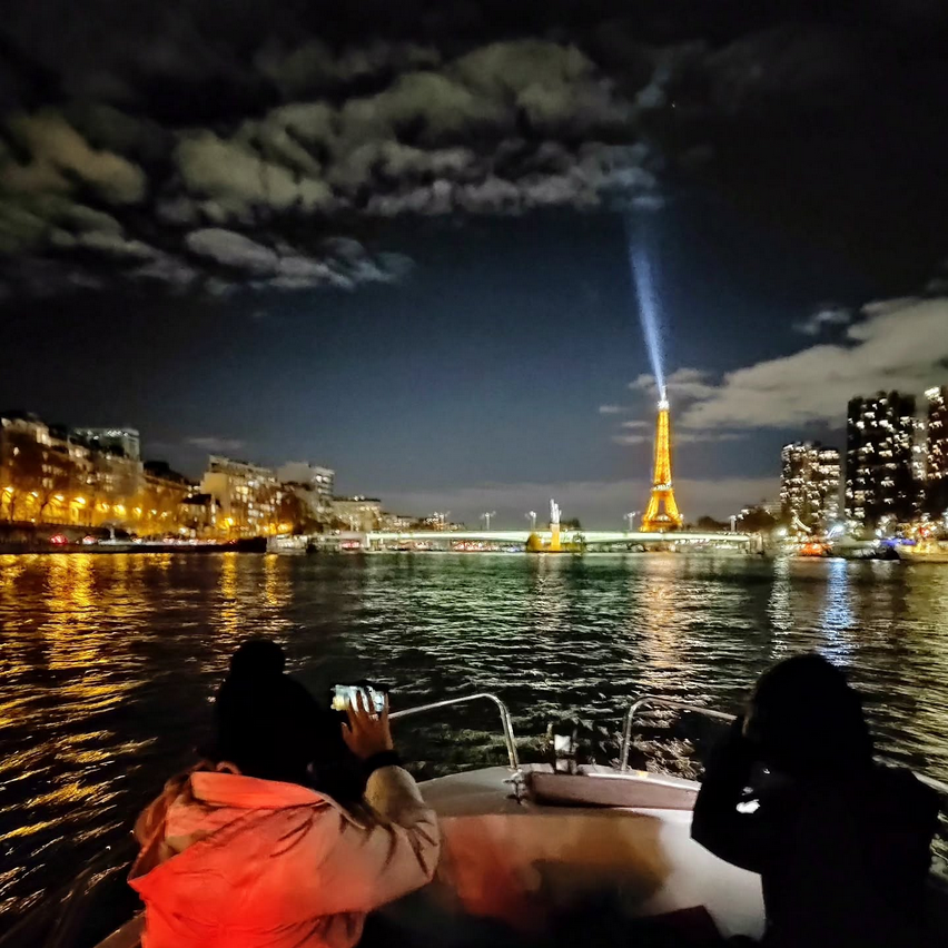 Eiffel Tower and Seine River cruise at night